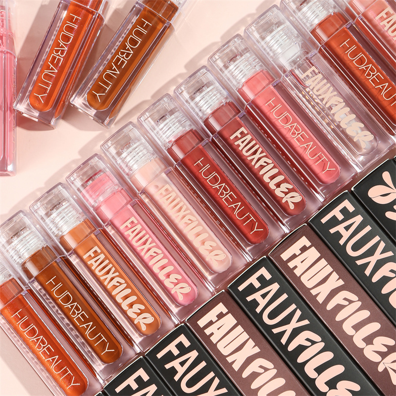 Beauty Huda Makeup - แบรนด์บิวตี้ ลิปกลอสเนื้อฟิลเลอร์ ให้ความเงางาม ไม่เหนียวเหนอะ ลิปสติกใสคริสตัล ให้ความชุ่มชื้น